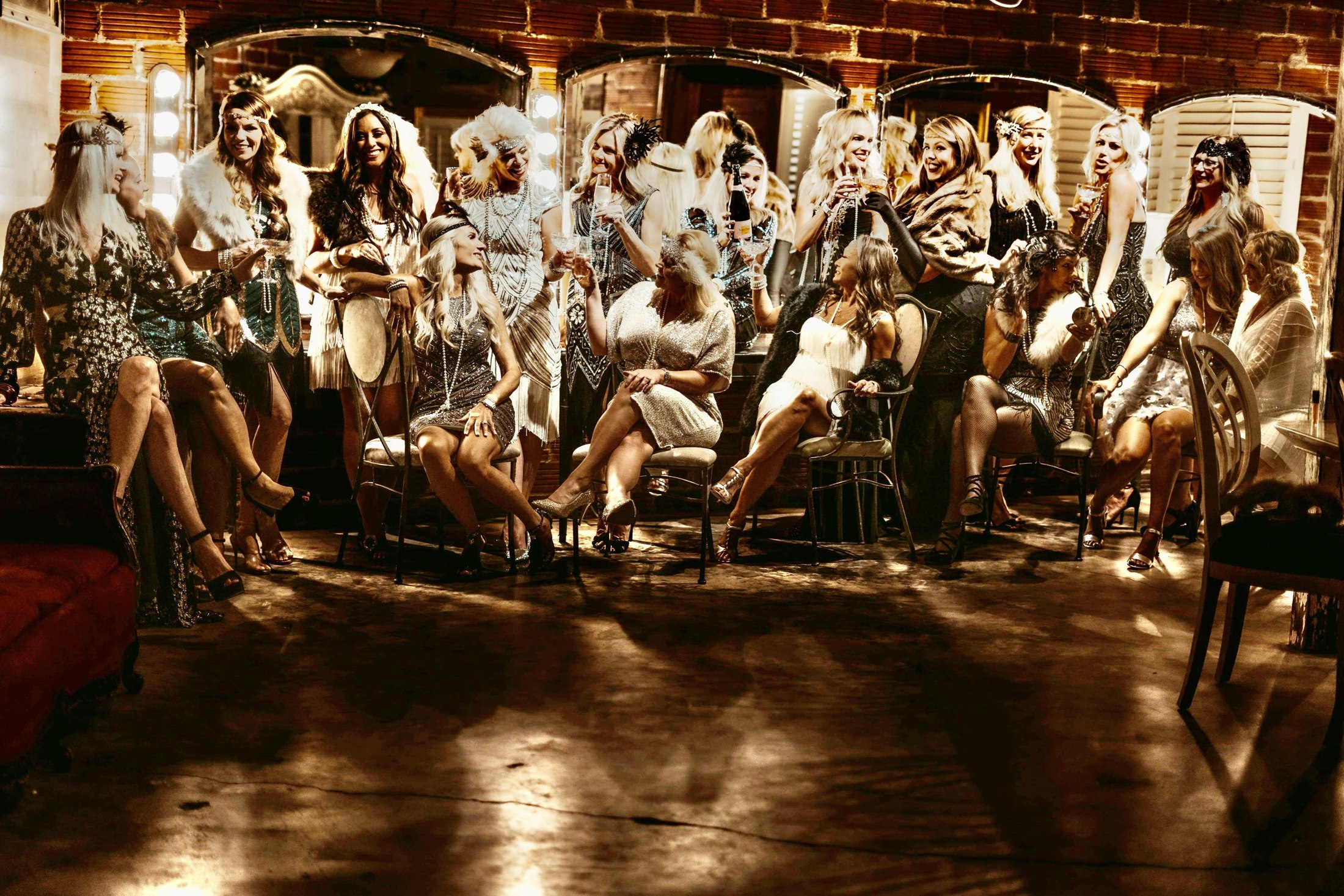 Gatsby Girls gathered in sparkling 1920s attire for a krewe celebration